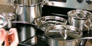 Cuisinart cookware being used on a freestanding gas stove