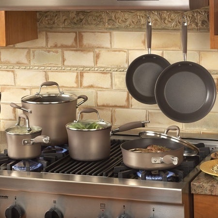 Cookware set for a rustic kitchen. The induction, non stick cookware in action on the stovetop