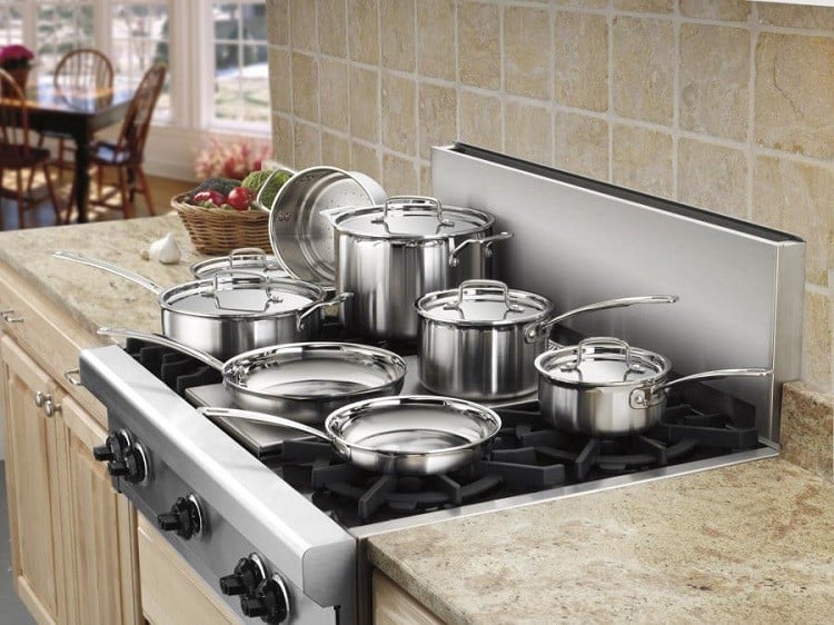 Cuisinart stainless steel cookware being used on a gas stovetop